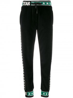 Спортивные брюки с логотипом на лампасах Dolce & Gabbana. Цвет: черный