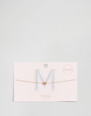 Ожерелье-чокер из цепочки с подвеской в виде буквы M Orelia. Цвет: золотой