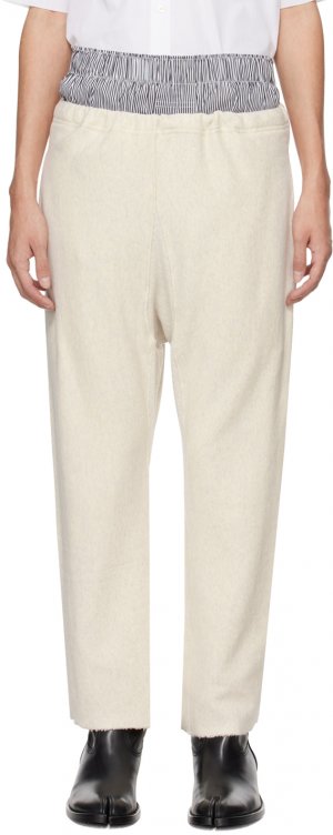Кремового цвета спортивные штаны с необработанными краями Maison Margiela