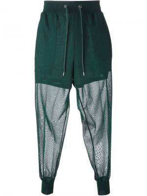 Прозрачные спортивные брюки Toga Pulla. Цвет: зелёный