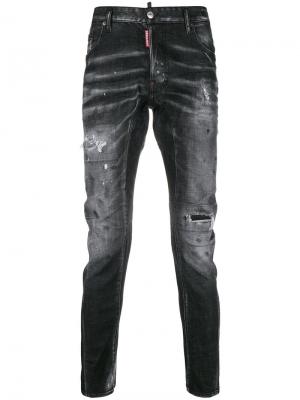 Зауженные джинсы с рваными деталями Dsquared2. Цвет: черный