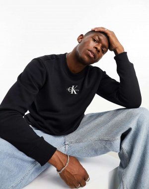 Черный свитшот с круглым вырезом и логотипом Calvin Klein Jeans. Цвет: черный