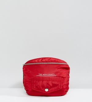 Красная большая дутая сумка-кошелек на пояс The New County. Цвет: красный