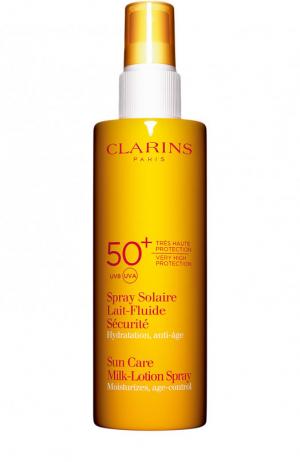 Солнцезащитное молочко-спрей для лица и тела SPF 50 Clarins. Цвет: бесцветный