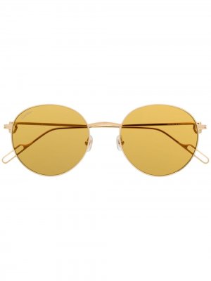 Солнцезащитные очки в круглой оправе Cartier Eyewear. Цвет: золотистый