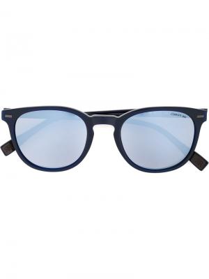 Солнцезащитные очки в круглой оправе Cerruti 1881. Цвет: синий