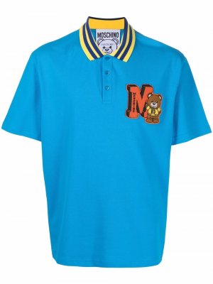 Рубашка поло с короткими рукавами и логотипом Moschino. Цвет: синий