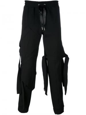Асимметричные спортивные брюки Nicopanda. Цвет: чёрный