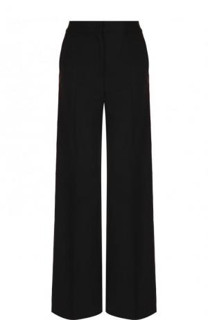 Расклешенные брюки из смеси шерсти и шелка с контрастными лампасами Dolce & Gabbana. Цвет: черный