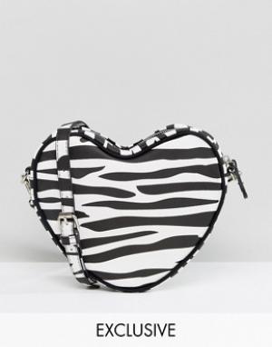 Эксклюзивная сумка через плечо в форме сердца с принтом зебру Lazy O Oaf. Цвет: черный
