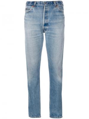 Зауженные джинсы с рваными деталями Re/Done. Цвет: синий