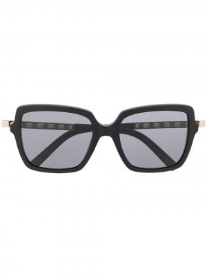 Tods солнцезащитные очки в массивной оправе с отделкой Tod's. Цвет: черный