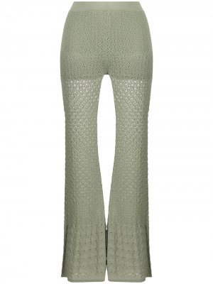 Расклешенные трикотажные брюки SANDRO. Цвет: зеленый