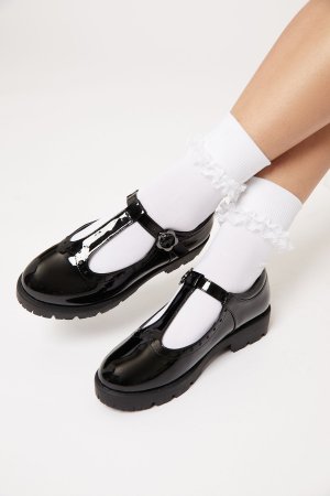 Лакированные школьные туфли Мэри Джейн с цветком на плоском каблуке , черный Lipsy