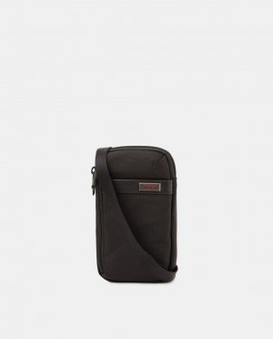 Маленькая нейлоновая сумка для мобильного телефона черного цвета с застежкой-молнией Tumi, черный TUMI