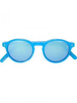 Солнцезащитные очки в круглой оправе Philippe Rouge. Цвет: синий