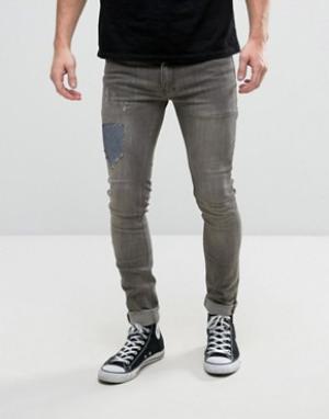 Эластичные супероблегающие джинсы с заплатками Religion. Цвет: серый