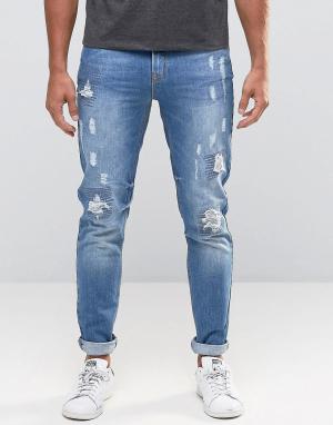 Зауженные джинсы с прорехами Hoxton Denim. Цвет: синий