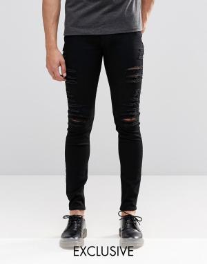 Черные рваные супероблегающие джинсы с низкой посадкой Cheap Monday. Цвет: черный