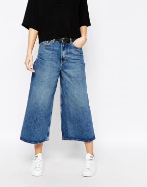 Бесшовные укороченные джинсы с широкими штанинами Extend Weekday. Цвет: синий