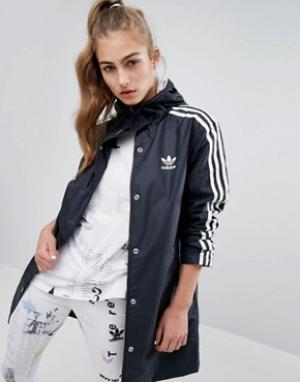 Куртка-дождевик с полосками и капюшоном adidas Originals. Цвет: черный