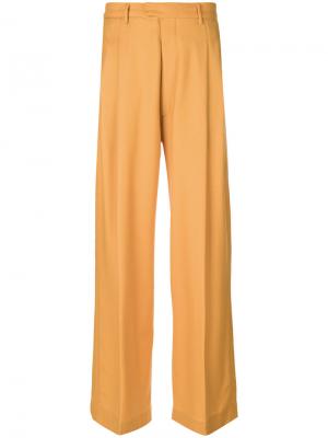 Широкие плиссированные брюки Eckhaus Latta. Цвет: жёлтый и оранжевый