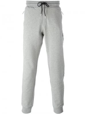 Спортивные брюки с присборенными щиколотками Bikkembergs. Цвет: серый