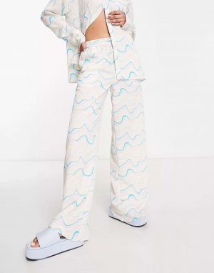 Комфортные брюки прямого кроя X Miss Lisibell с волнистым полосатым принтом NA-KD