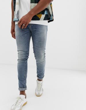 Выбеленные зауженные джинсы со вставками United Colors Of Benetton. Цвет: синий