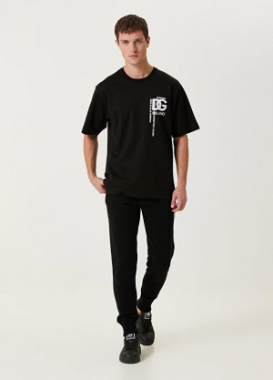 Черные шерстяные спортивные брюки с логотипом и кулиской на талии Dolce&Gabbana. Цвет: черный
