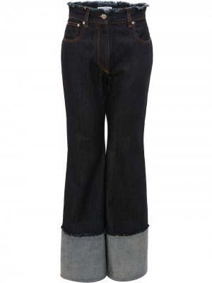 Расклешенные джинсы с необработанными краями JW Anderson. Цвет: синий