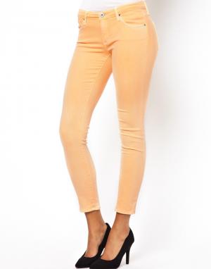 Ярко-персиковыe зауженные джинсы AG Denim. Цвет: ярко-персиковый