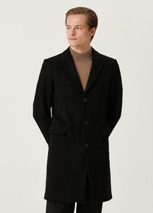 Черное шерстяное пальто Sandro. Цвет: черный