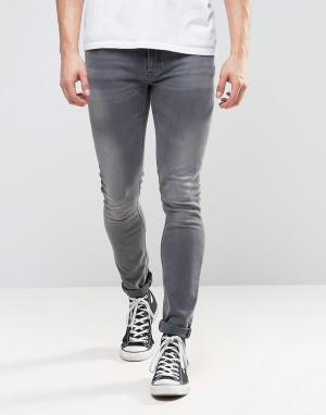 Выбеленные джинсы скинни Co Lin Nudie Jeans. Цвет: серый