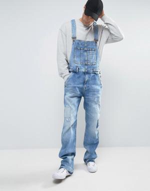 Джинсовый комбинезон с рваной отделкой и заплатками Pepe Dougie Jeans. Цвет: синий