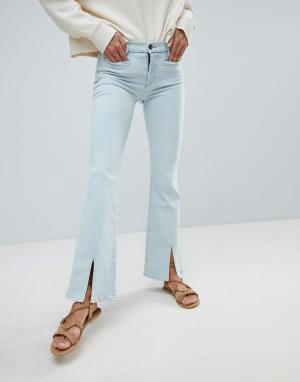 Расклешенные джинсы с разрезами Mih Jeans Marrakesh. Цвет: синий