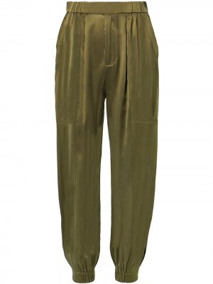 Зауженные брюки Neha Nicholas. Цвет: зеленый
