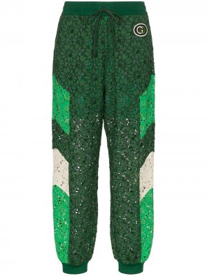 Кружевные спортивные брюки Gucci. Цвет: зеленый