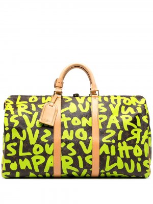 Дорожная сумка Keepall 50 2008-го года с монограммой Graffiti Louis Vuitton. Цвет: коричневый