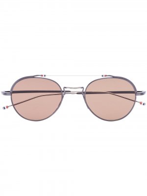 Солнцезащитные очки в круглой оправе Thom Browne Eyewear. Цвет: серый