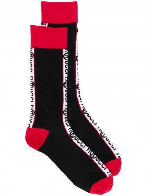 Носки с полосками и логотипом Fiorucci. Цвет: черный